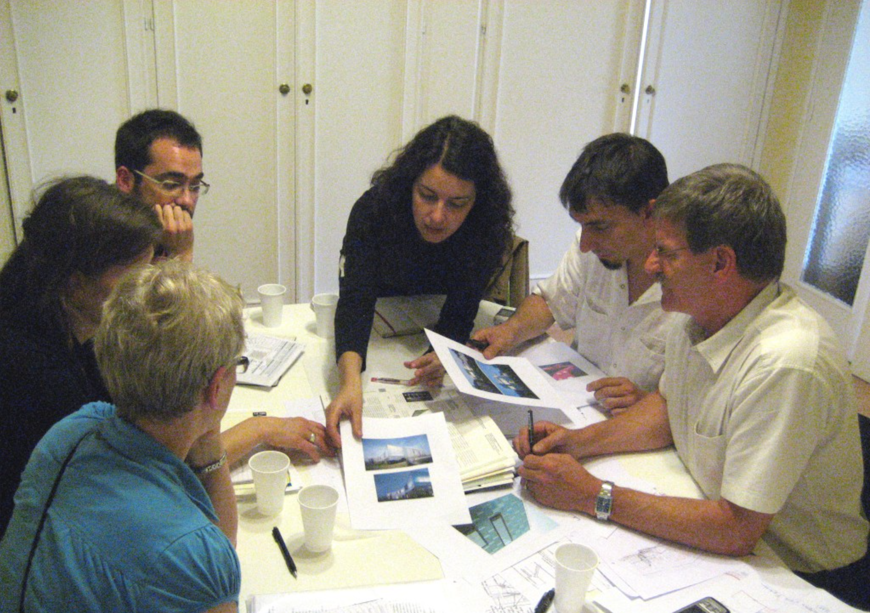 The team discussing with the client